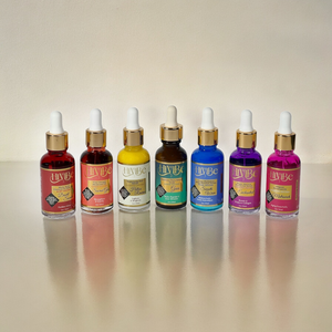 colorful rainbow chakra tuned skincare infused with solfeggio frequencies